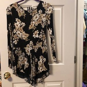 Black floral boutique  romper with open back!